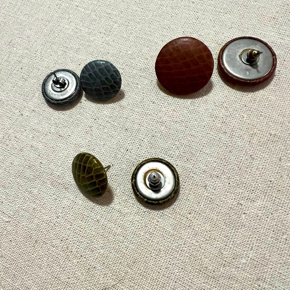Bundle of 3 pairs of “leather” studs